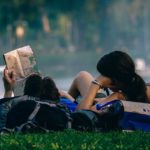 couple looking at map outside