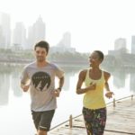 a man and a woman running