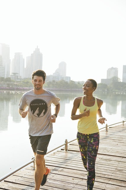 a man and a woman running