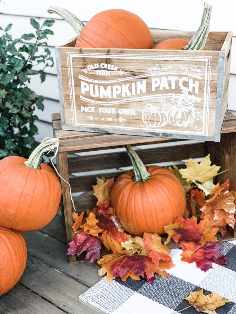 Wooden Crates full of Pumpkins and leaves