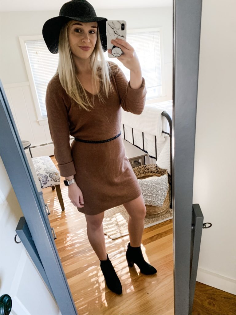 Girl in a sweater dress and boots