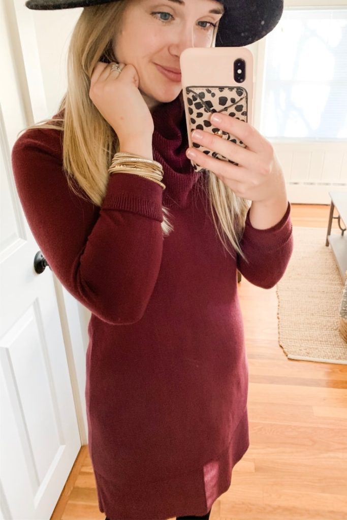 girl in a sweater dress and wrap bracelet