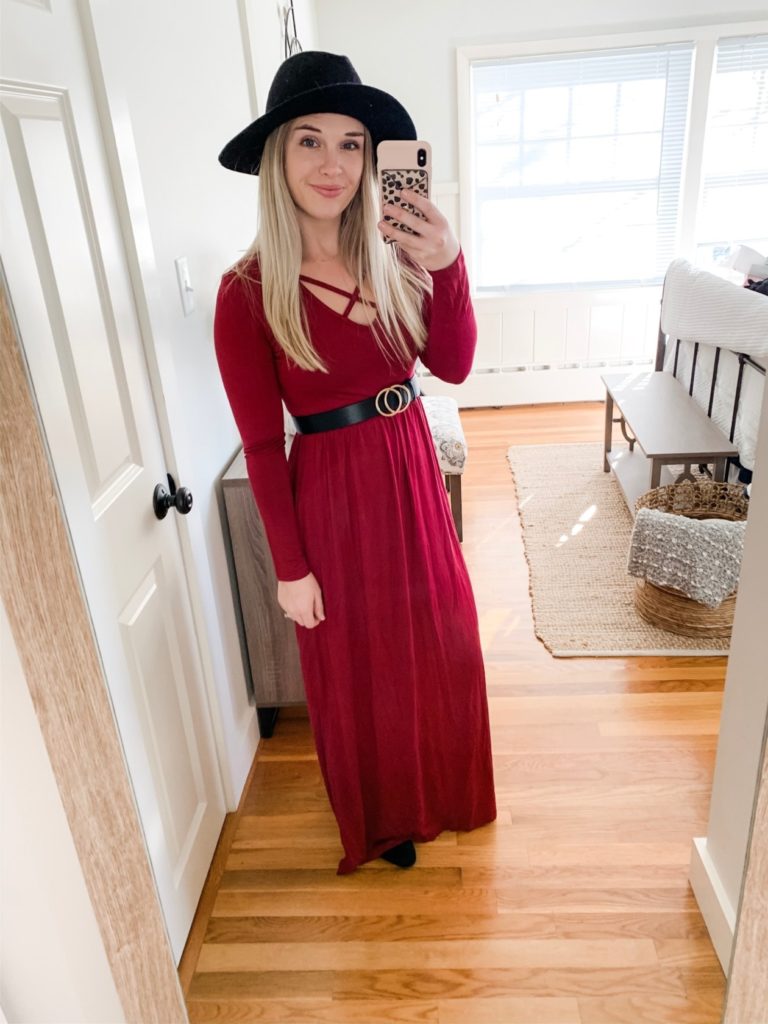 Girl with red maxi dress, belt and a hat