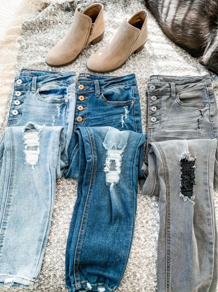 Distressed jeans and a pair of booties