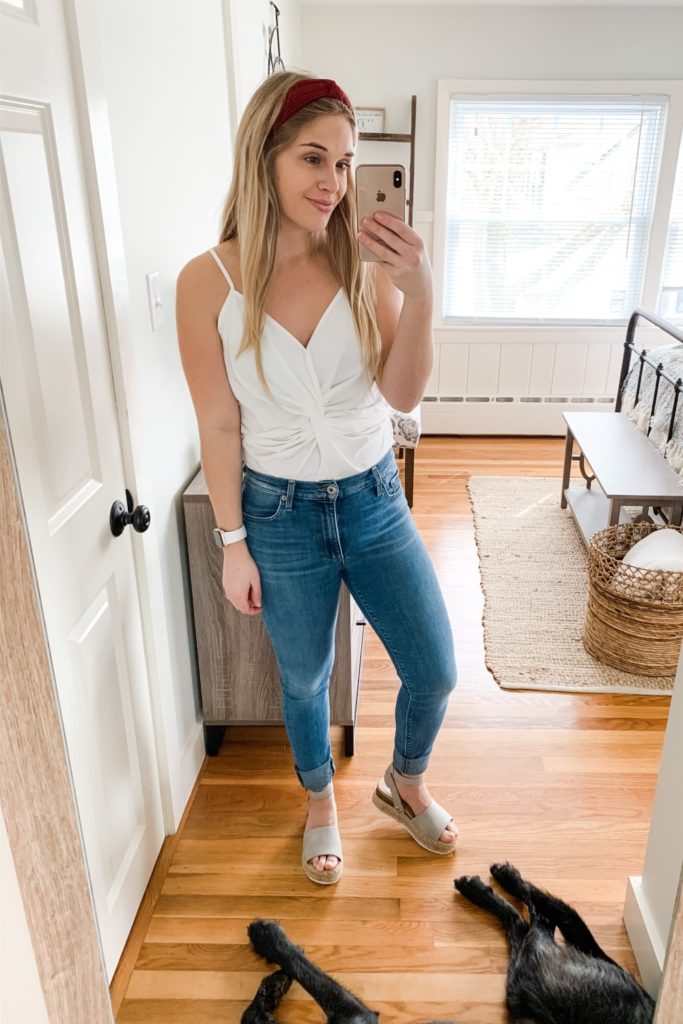 girl wearing white twist tanktop and jeans with espadrille sandals